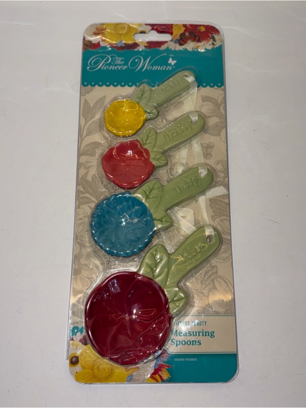The Pioneer Woman Teal Floral-Patterned Measuring Spoon Set Packaging